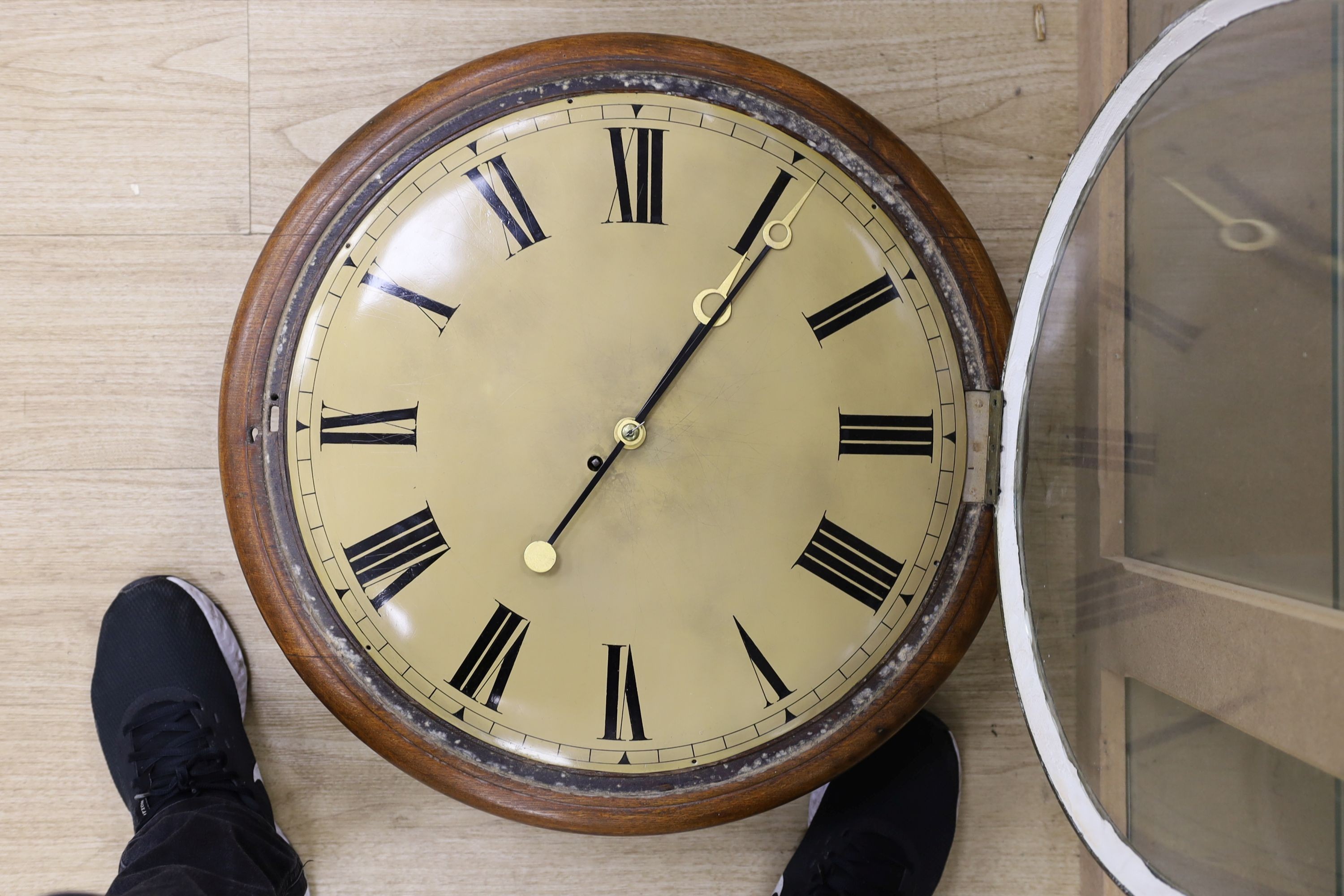 A large Victorian oak-cased dial clock, 56 cms diameter.